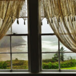 High ceilings and large windows add to a room's beauty