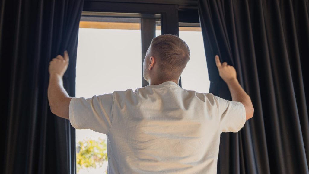 Senior using smooth curtain track